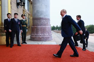 Vladimir Putin arrives for a meeting with China's president Xi Jinping in Beijing
